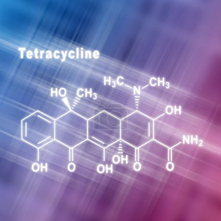 Foto de Antibiótico tetraciclina, fórmula química estructural fondo rosa azul - Imagen libre de derechos