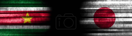 Photo for Suriname and Japan Flags on Black Background - Royalty Free Image