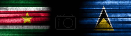 Photo for Suriname and Saint Lucia Flags on Black Background - Royalty Free Image