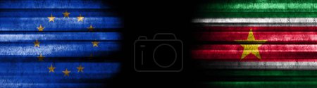 Photo for European Union and Suriname Flags on Black Background - Royalty Free Image