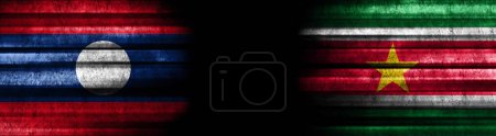 Photo for Laos and Suriname Flags on Black Background - Royalty Free Image