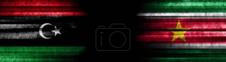 Photo for Libya and Suriname Flags on Black Background - Royalty Free Image