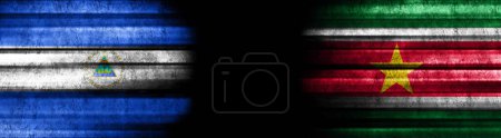 Photo for Nicaragua and Suriname Flags on Black Background - Royalty Free Image
