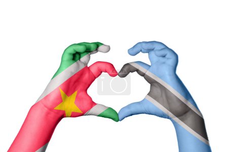 Photo for Suriname Botswana Heart, Hand gesture making heart, Clipping Path - Royalty Free Image