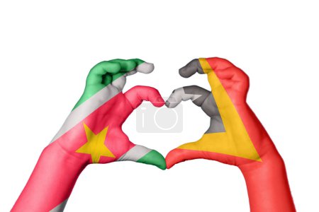 Photo for Suriname East Timor Heart, Hand gesture making heart, Clipping Path - Royalty Free Image