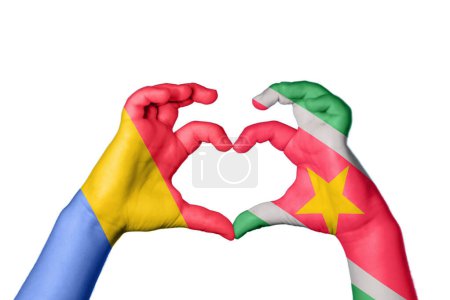 Photo for Romania Suriname Heart, Hand gesture making heart, Clipping Path - Royalty Free Image