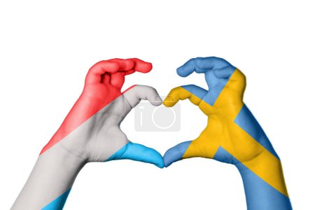 Photo for Luxembourg Sweden Heart, Hand gesture making heart, Clipping Path - Royalty Free Image
