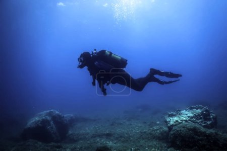 Scuba Diver Meeresboden, Taucher erkunden