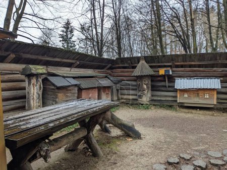Téléchargez les photos : The open-air museum of traditional wooden architecture in the national park in Ukraine, wooden house view - en image libre de droit