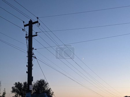 Photo for High voltage tower, electricity transmission lines - Royalty Free Image