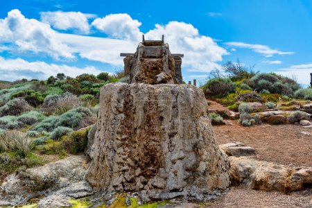 Photo for Cape Leeuwin water wheel, sometimes called the petrified water wheel, is a non-operating water wheel, near Cape Leeuwin, in the south-west of Western Australia. - Royalty Free Image