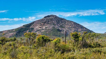 Photo for Frenchman Peak is a distinctively shaped rocky peak with a cave and a steep trail to the summit. - Royalty Free Image