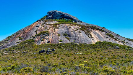 Photo for Frenchman Peak is a distinctively shaped rocky peak with a cave and a steep trail to the summit. - Royalty Free Image
