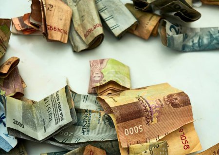 A collection of various kinds of Indonesian money