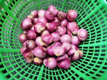 Pile of fresh shallots in basket