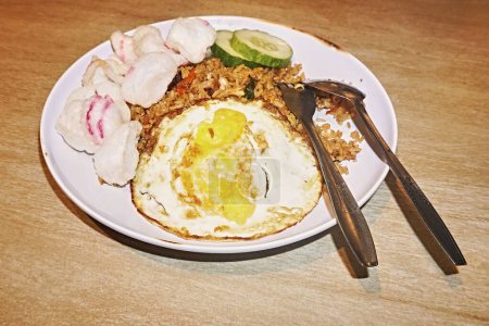 Fried rice with omelet as a side dish