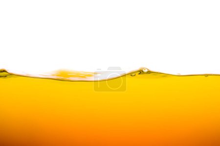 Foto de Orange juice is isolated on white background. healthy fresh drink and natural waves. close up view. - Imagen libre de derechos