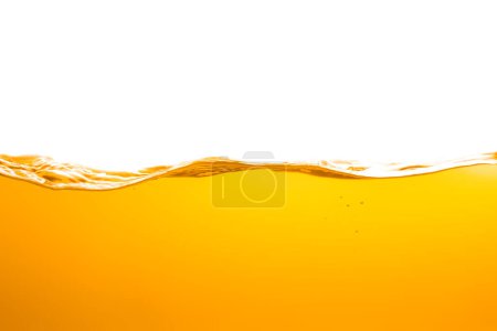 orange juice is isolated on white background. healthy fresh drink and natural waves. close up view.