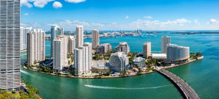 Aerial panorama of Brickell Key in Miami, Florida. Brickell Key also called Claughton Island is a man-made island off the mainland Brickell neighborhood of Miami, Florida.