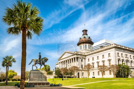 South Carolina State House, in Columbia, SC, and Wade Hampton III Statue on a sunny morning. The South Carolina State House is the building housing the government of the U.S. state of South Carolina