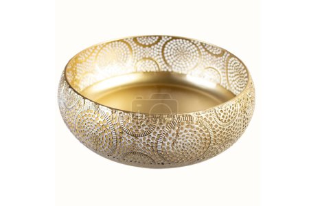 Engraved golden bowl, isolated on white, aoft focus close up