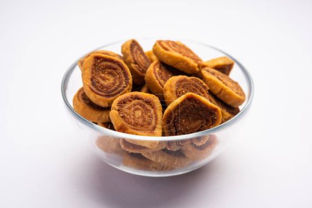 Photo for Bhakarwadi or Bakarvadi or Bhakharwadi is an Indian traditional Snacks originating from Pune - Royalty Free Image