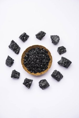Photo for Shilajit is an ayurvedic medicine found primarily in the rocks of the Himalayas. selective focus - Royalty Free Image