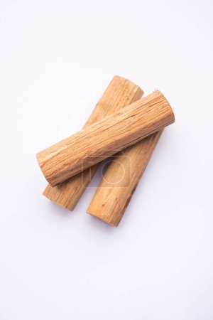 Photo for Chandan or sandalwood powder with sticks, perfume or oil which retain their fragrance for decades - Royalty Free Image