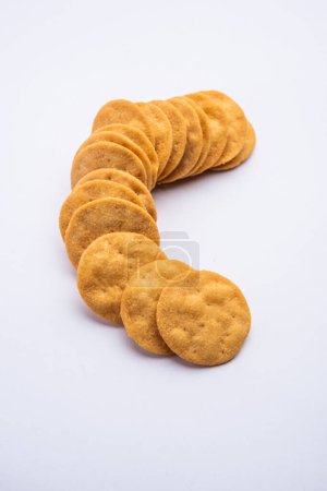 Photo for Mathri or mathari is a Rajasthani, Indian snack and a type of flaky biscuit, tea time snack - Royalty Free Image