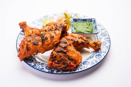 Téléchargez les photos : Tandoori Chicken est une nourriture épicée indienne non végétarienne - en image libre de droit