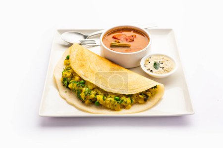 Photo for A dosa, also called dosai, dosey, or dosha, is a thin pancake in South Indian cuisine - Royalty Free Image