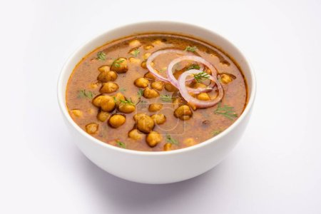 Téléchargez les photos : Punjabi Chana Masala ou Chole Masala, est un curry authentique de style nord-indien fait avec des pois chiches - en image libre de droit