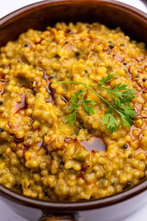 Téléchargez les photos : Millet Khichdi or bajra khichadi is a one pot healthy and protein rich gluten-free Indian meal - en image libre de droit