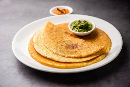 Photo for Savory Oats Dosa or Semolina pancakes makes a Healthy south indian breakfast - Royalty Free Image