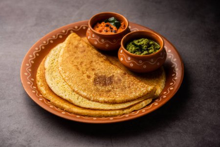 Téléchargez les photos : Savory Oats Dosa or Semolina pancakes makes a Healthy south indian breakfast - en image libre de droit