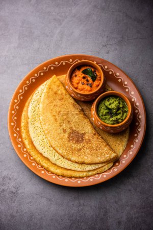 Photo for Savory Oats Dosa or Semolina pancakes makes a Healthy south indian breakfast - Royalty Free Image