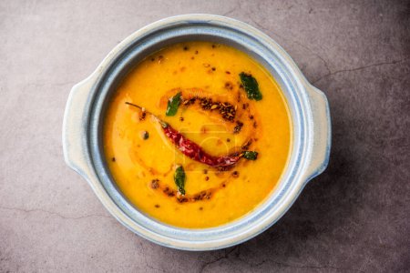 Photo for Khatti Dal is a food from India, a Hyderabadi cuisine, dal made using Masoor or Toor dal - Royalty Free Image