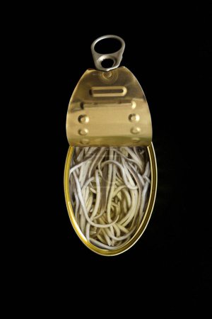 Photo for Can of elvers on black background - Royalty Free Image