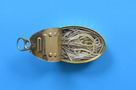 Photo for Can of elvers on blue background - Royalty Free Image