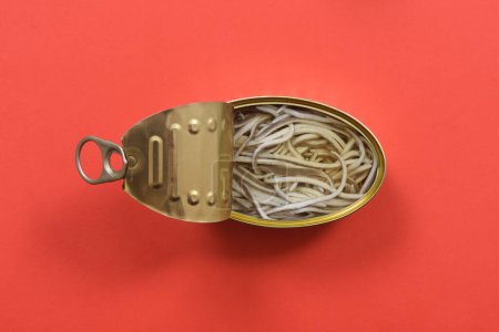 Photo for Can of elvers on red background - Royalty Free Image