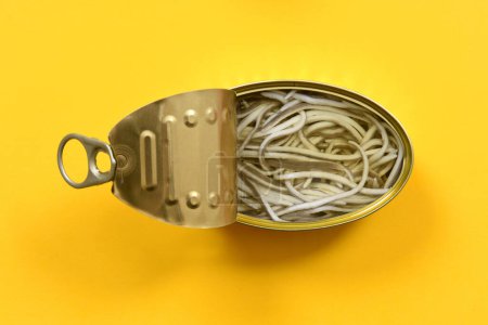Photo for Can of elvers on yellow background - Royalty Free Image