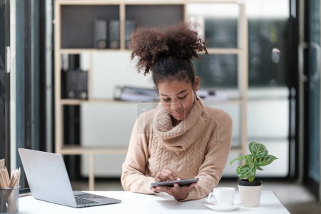 American African Woman working in the office with computer phone and Tablet. High quality photo magic mug #647707256