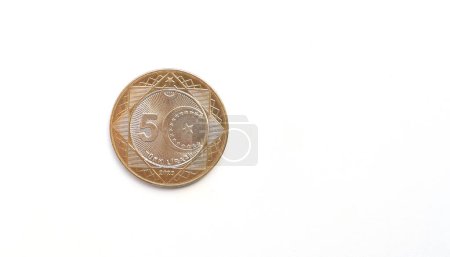 5 Turk lirasi. Top view of new metal five Turkish Lira coins on white background