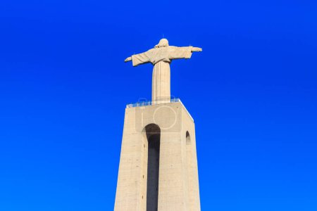 Photo for The Sanctuary of Christ the King (Cristo Rei) overlooking the city of Lisbon situated in Almada, in Portugal - Royalty Free Image