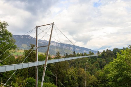 Suspension pedestrian panorama bridge over the Gummi gorge in Sigriswil, Switzerland