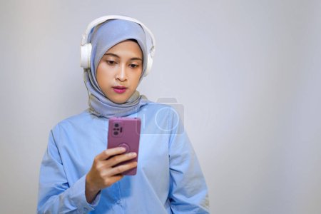 Photo for Woman confuse of what music she should listen to - Royalty Free Image