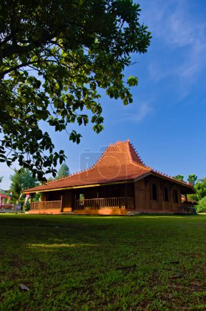 Photo for Jakarta, Indonesia, May 14 2023, traditional house from Central Java Indonesia, the building which is commonly called the pavilion or joglo house, joglo architecture from Java. Usually used for ceremonies and made of brown teak wood - Royalty Free Image