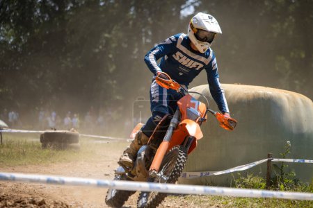 Photo for Dordogne, France May 30 2023 :  Mud, Grit, and Glory: Chronicles of a Motocross Rider - Royalty Free Image