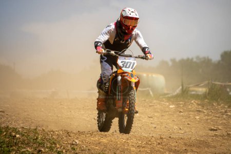 Photo for Dordogne, France May 30 2023 :  Mud, Grit, and Glory: Chronicles of a Motocross Rider - Royalty Free Image