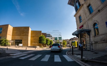 Photo for Perigueux, france June 14 2023 : Urban Flow: The Dynamic Movement of Cars in the City - Royalty Free Image